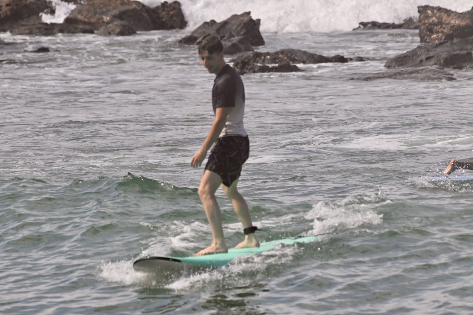 Me surfing a tiny wave in Puerto Escondido