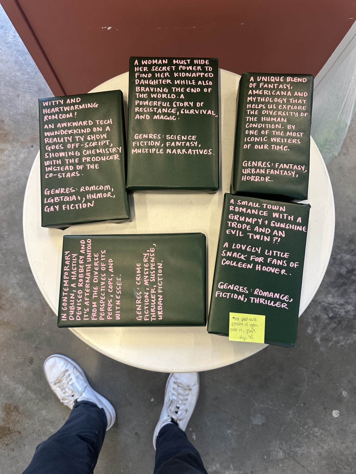 A table at SF’s Telescope Coffee covered in disguised books