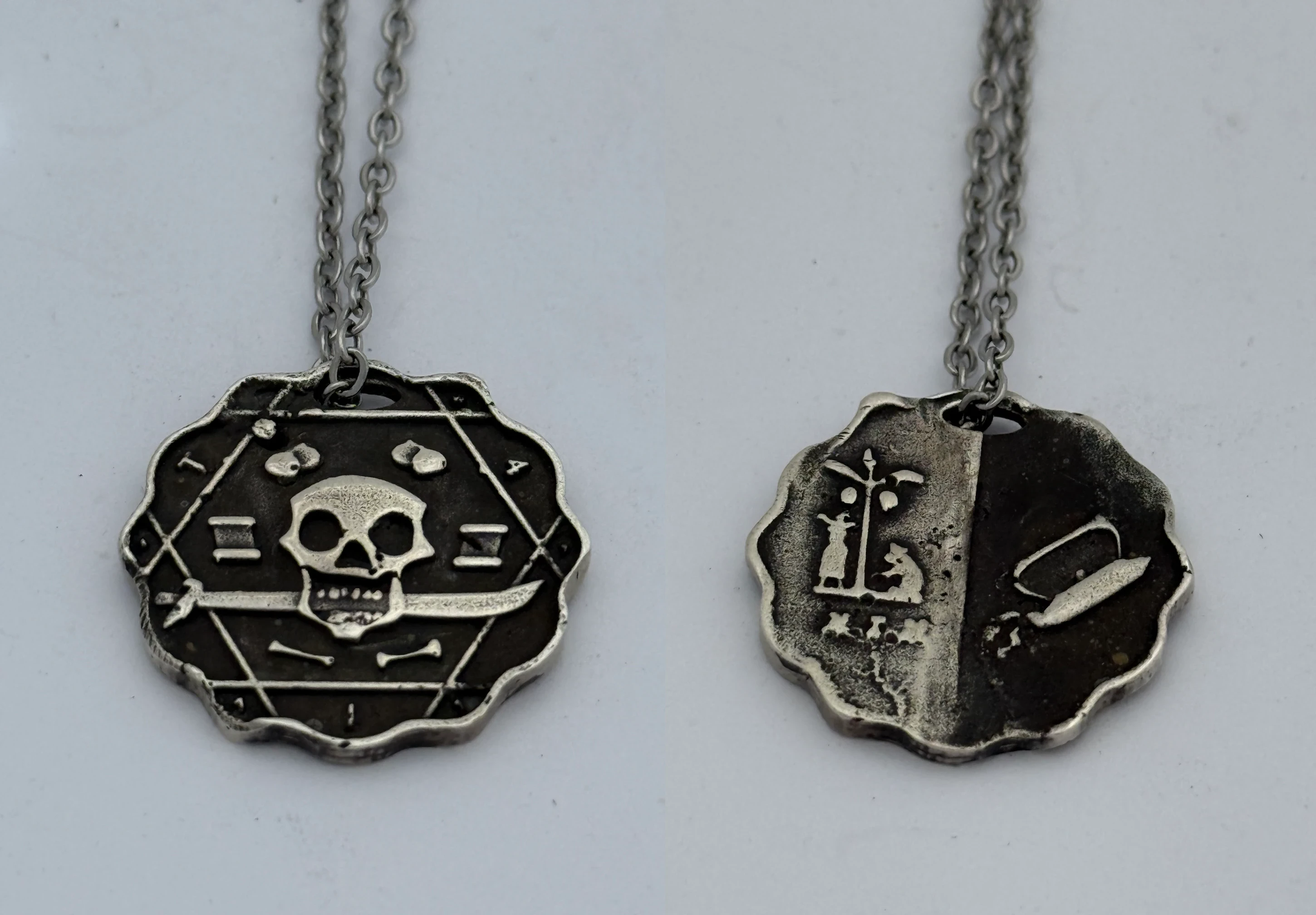 The front and back sides of my silver piece of eight, side by side.