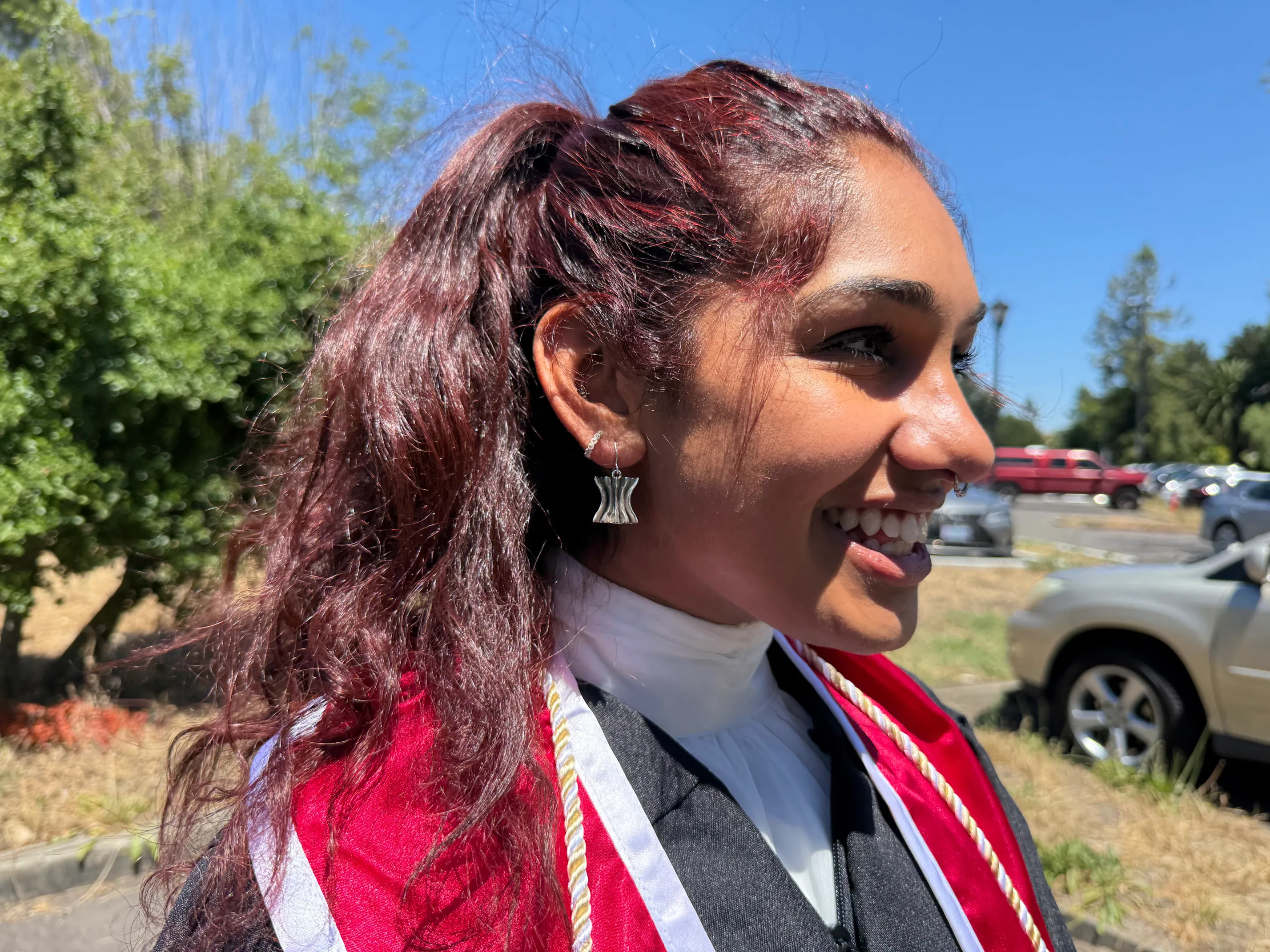 My lovely girlfriend Nageena wearing her custom earings on Graduation Day.