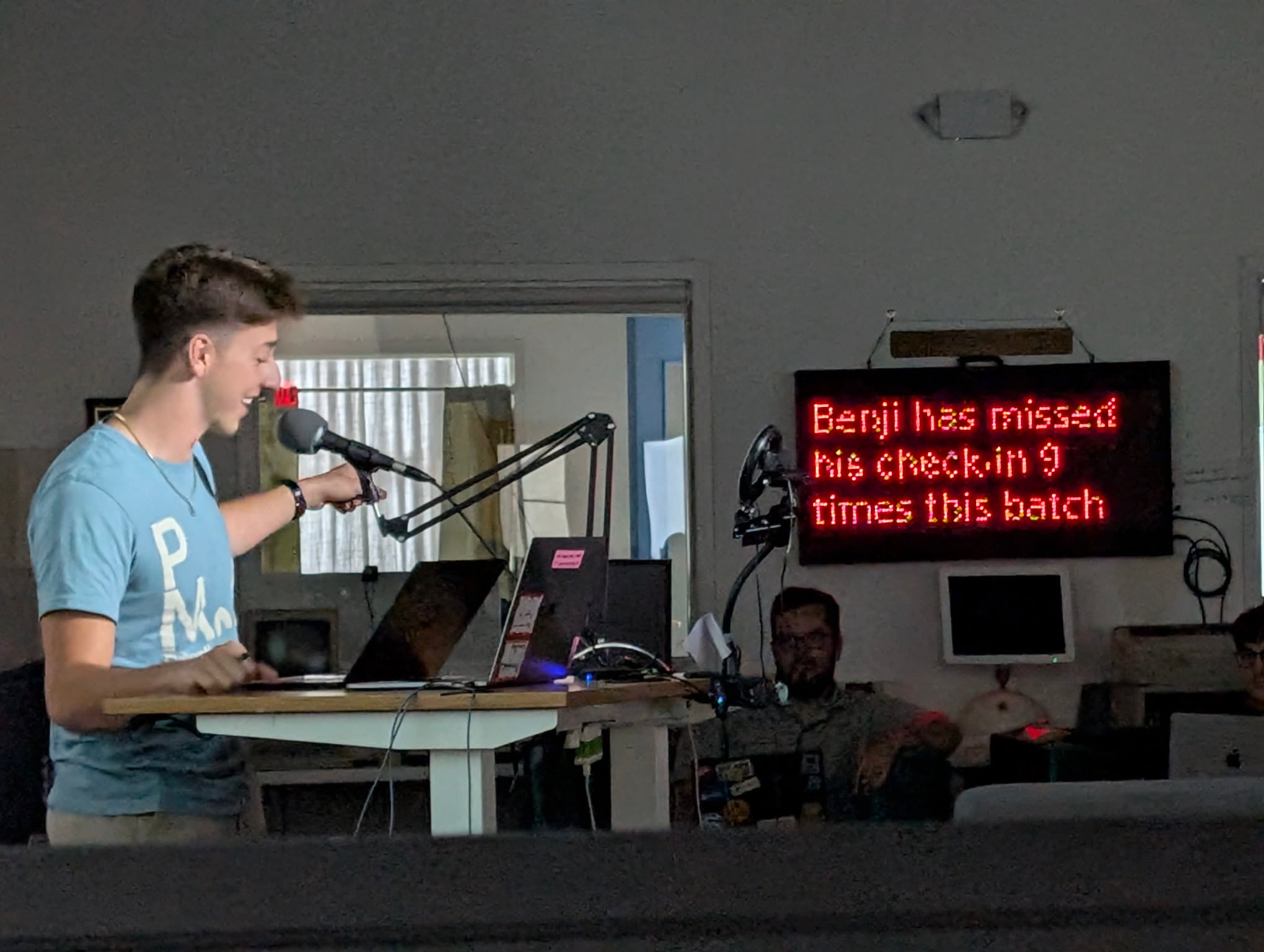 Me pointing to the Rapid Riter, which is displaying my script.