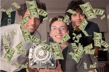 My team celebrating the completion of the device (from right to left: Vivek, Benji, Trun).